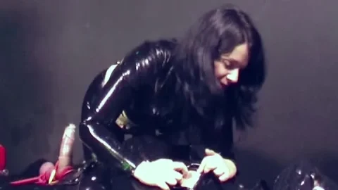 Isis Seven in Rubber Latex Bondage Tease